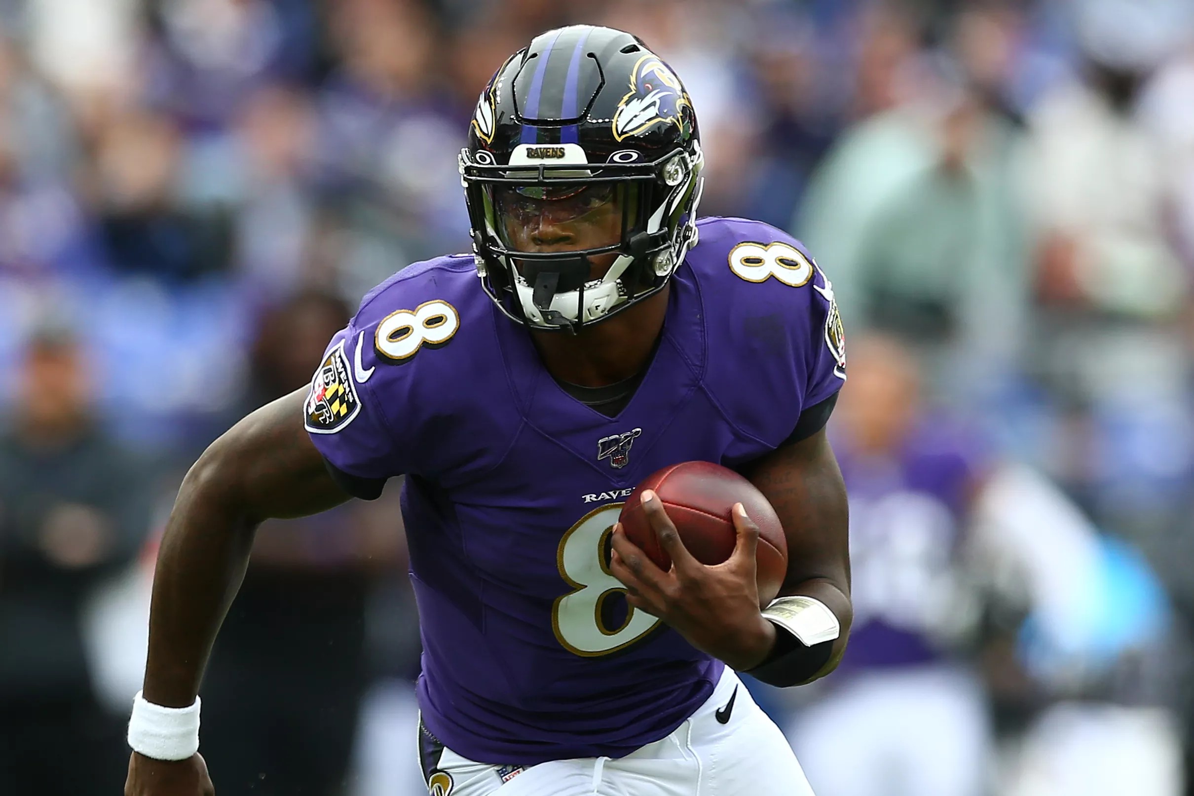 Lamar Jackson breaks the NFL record for most rushing yards by a quarterback