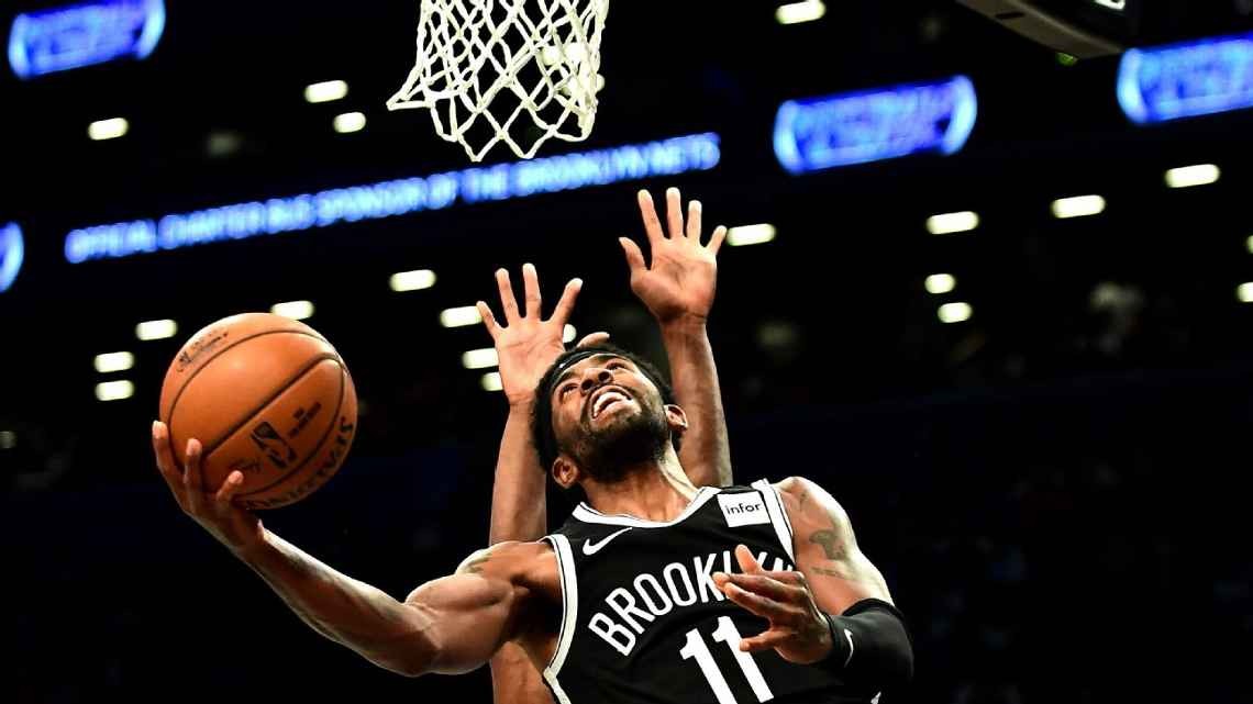 Kyrie Irving scores 50 in debut, but Nets lose to Timberwolves in OT