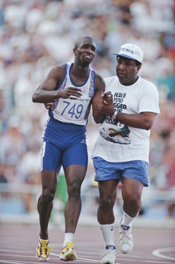 Jim Redmond, Who Created Olympics Moment Helping Son, Dies at 81