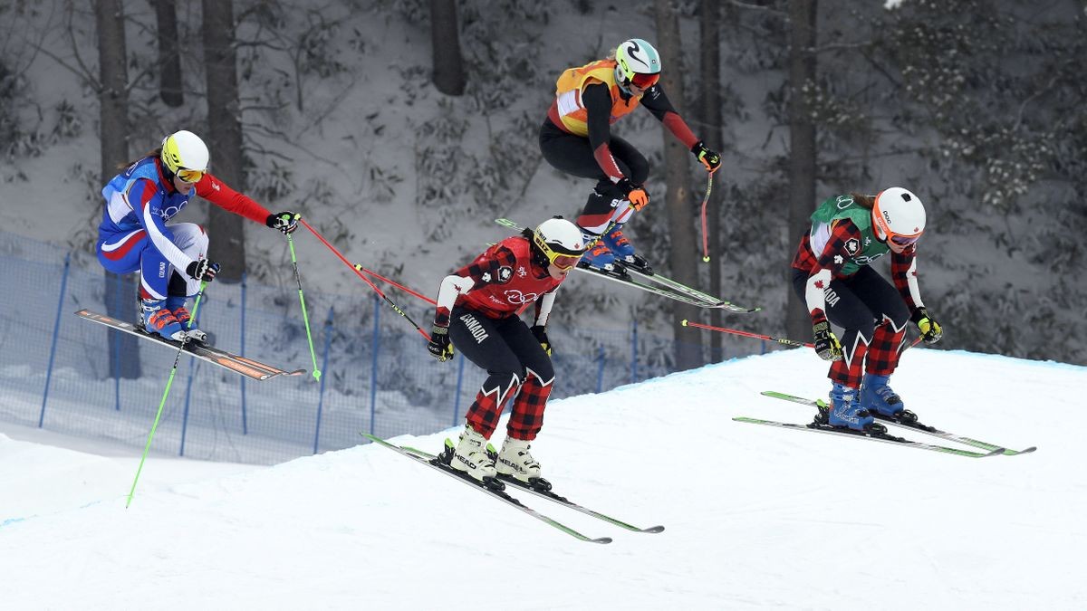 The Latest: Canada's Serwa races to victory in skicross