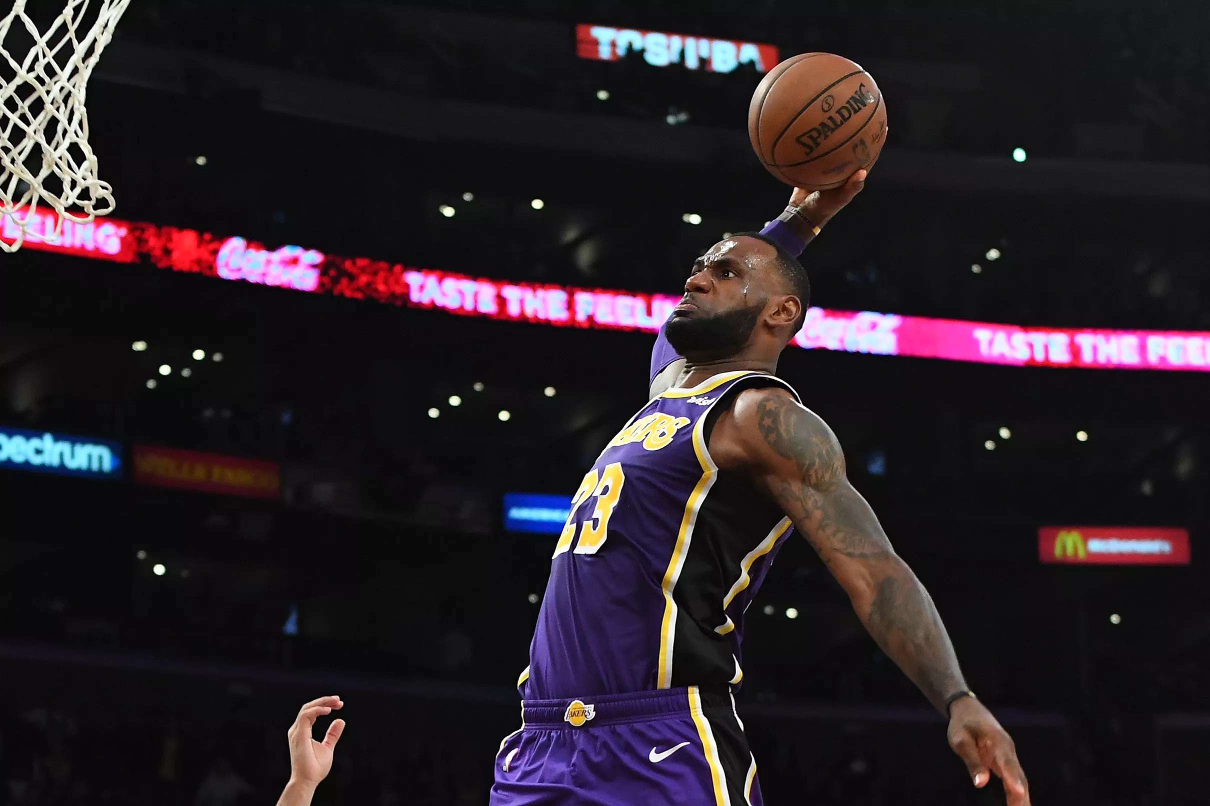 Huge shot from LeBron James helps Lakers hold on in must-win game ...