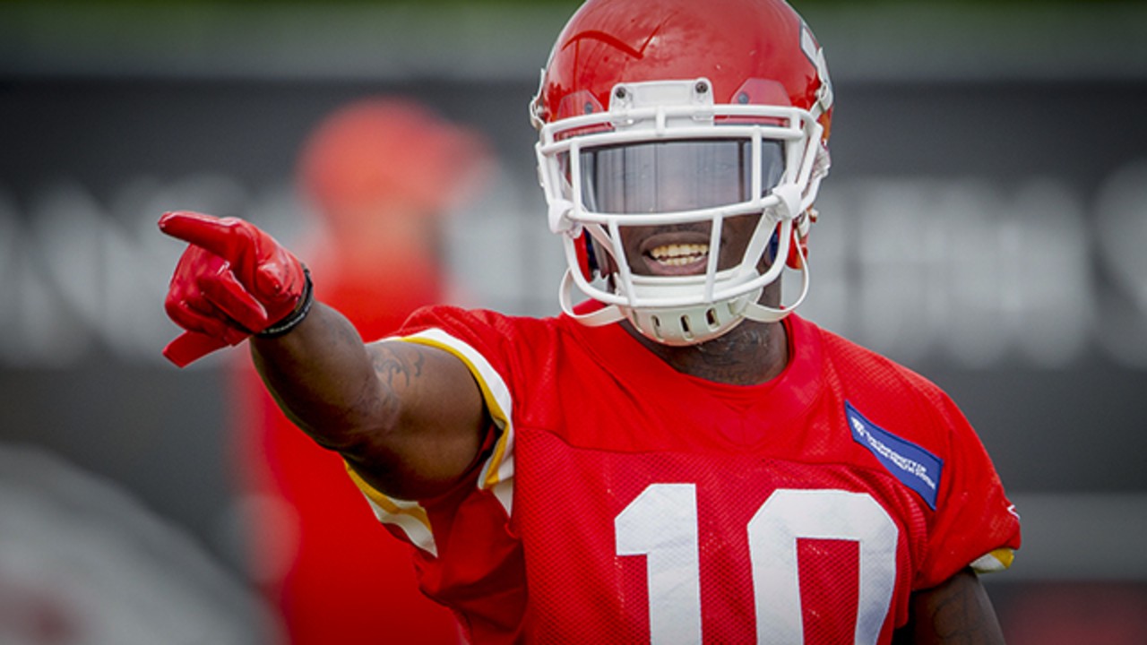 Chiefs receiver Tyreek Hill studies the playbook ... and gets his ...