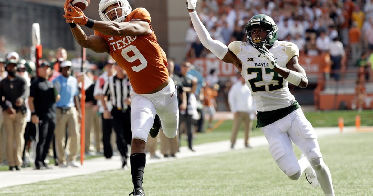 Texas injury update: WR Collin Johnson injures knee but still expected ...