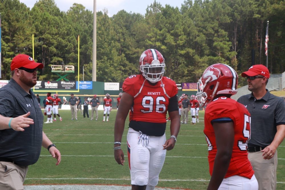 Eric Taylor enjoys conversation with Saban